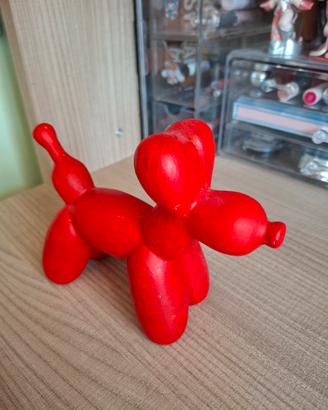Statuetta palloncino a forma di cane rosso
