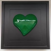 Heart in frame. cuore verde in cornice in legno co