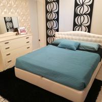 Letto imbottito contenitore due piazze esposizione