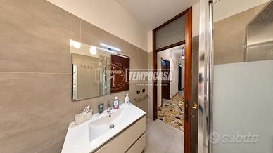 QUADRILOCALE CON TERRAZZO E GARAGE