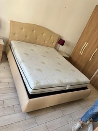 Letto matrimoniale contenitore con doghe in legno