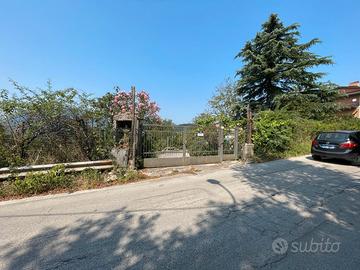 Terreno con deposito