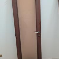 Porta in noce con vetro decorato 