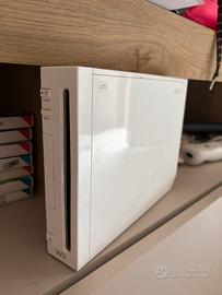Nintendo Wii con 12 Giochi e adattatori video
