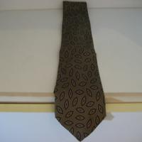 Cravatta in pura seta verde scuro con foglie blu