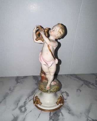 Puttino con lira VOLTA porcellana