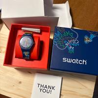 Swatch dragon in waves