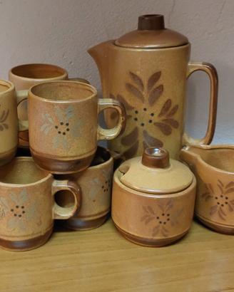 Set tazze, porta caffè, zucchero e latte