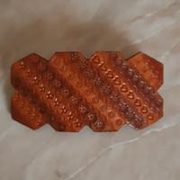 Fermacapelli in cuoio 