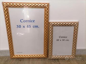 Cornici in legno dorate