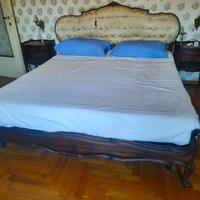 letto con testata imbottita