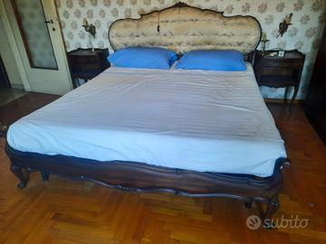 letto con testata imbottita