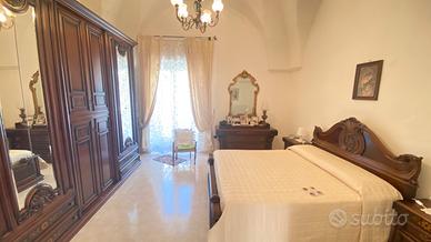 camera da letto stile classico