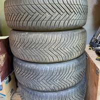 4 cerchi in lega + 4 gomme + batteria