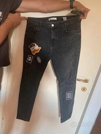 Jeans neri strappati vernice Zara