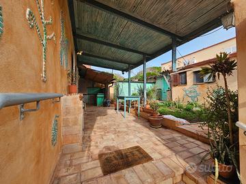 Appartamento con giardino privato