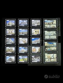 Cartelli espositore led vetrina