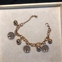 Bracciale dorato con pendenti , albero della vita