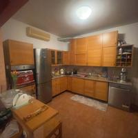 Cucina angolare in legno massiccio