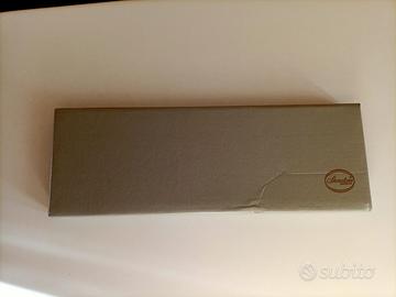 Set di due coltelli con manico in argento