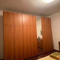 Camera Poliform in Noce