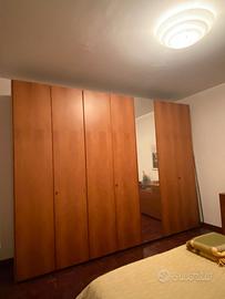 Camera Poliform in Noce