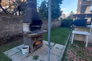 Appartamento con giardino angolare