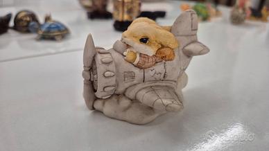 soprammobile coppia di coniglietti in aeroplano 