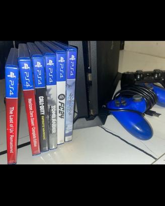 Play Station 4 Slim + 2 controller e 6 videogiochi