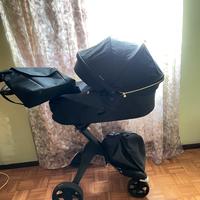 Stokke con borsa e ombrello
