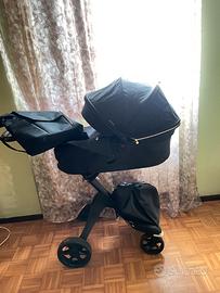 Stokke con borsa e ombrello