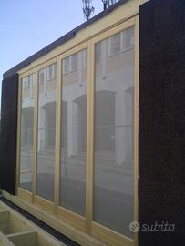 serramenti da esterno con vetrate fisse e porte 