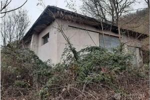 Terreno con costruzione da rifinire