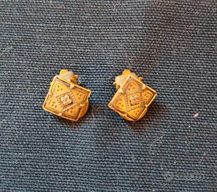 Orecchini clip dorati a rombo