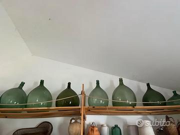 Antiche damigiane in vetro soffiato