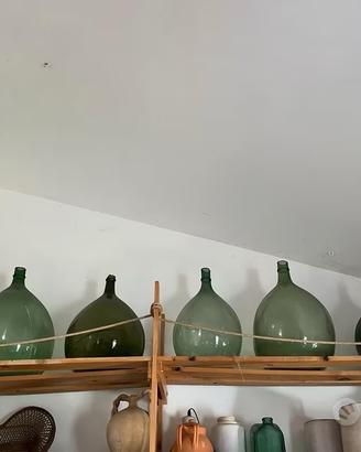 Antiche damigiane in vetro soffiato