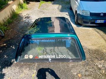 Copricassone Mitsubishi l200