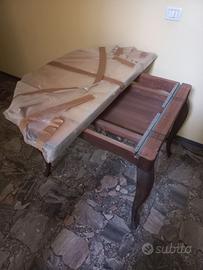 Tavolo rotondo allungabile in legno noce massello