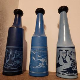 Meravigliose Bottiglie Dali' con tappi originali