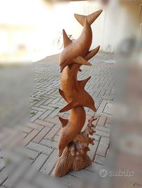 scultura in legno balinese delfini danzanti