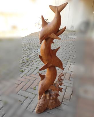 scultura in legno balinese delfini danzanti