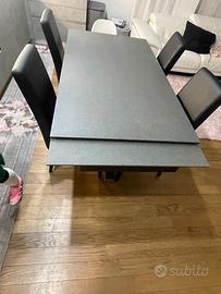 Tavolo 6/12 posti in granito con 4 sedie eco pelle