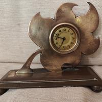 orologio antiquariato fatto a fiore 