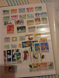 Francobolli varie nazioni con raccoglitore