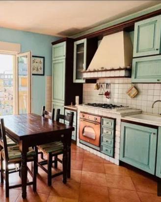 cucina artigianale in legno massello e muratura 