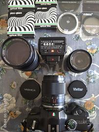 YASHICA con obiettivi ed accessori