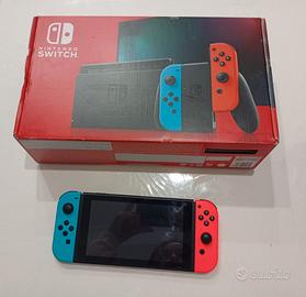 Nintendo Switch con giochi, accessori ed attrezzi