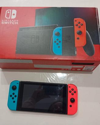Nintendo Switch con giochi, accessori ed attrezzi