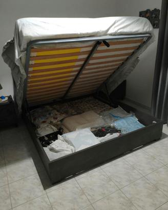 Rete matrimoniale con sollevamento per cassettone