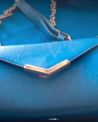 Pochette blu royal nuova con etichetta primadonna